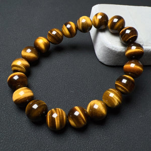 The bracelet is made of natural top-quality brown tiger eye gemstones