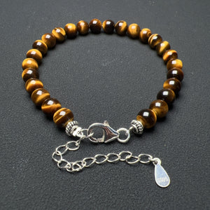 Each gemstone is carefully selected and strung together to create a harmonious balance of style and healing properties. 
