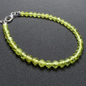 This stunning bracelet is crafted with natural, high-quality healing gemstones, featuring 4mm top-grade faceted green peridot beads totaling 39 beads.