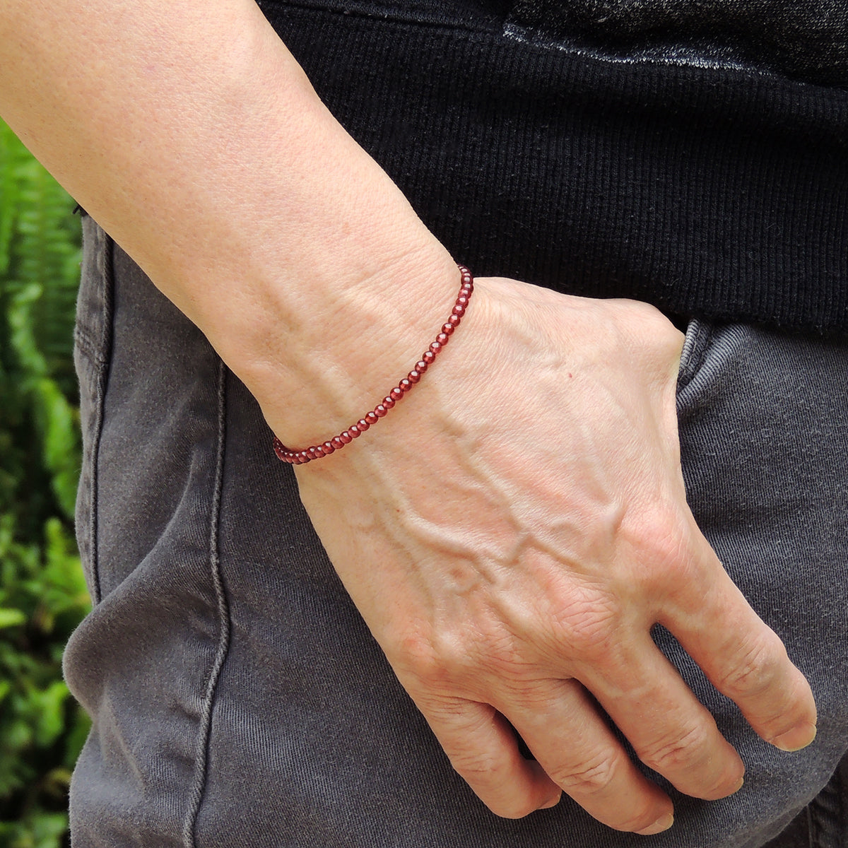 Crafted with care, this bracelet features natural, high-quality 3.5mm garnet beads, totaling 46 beads in all.